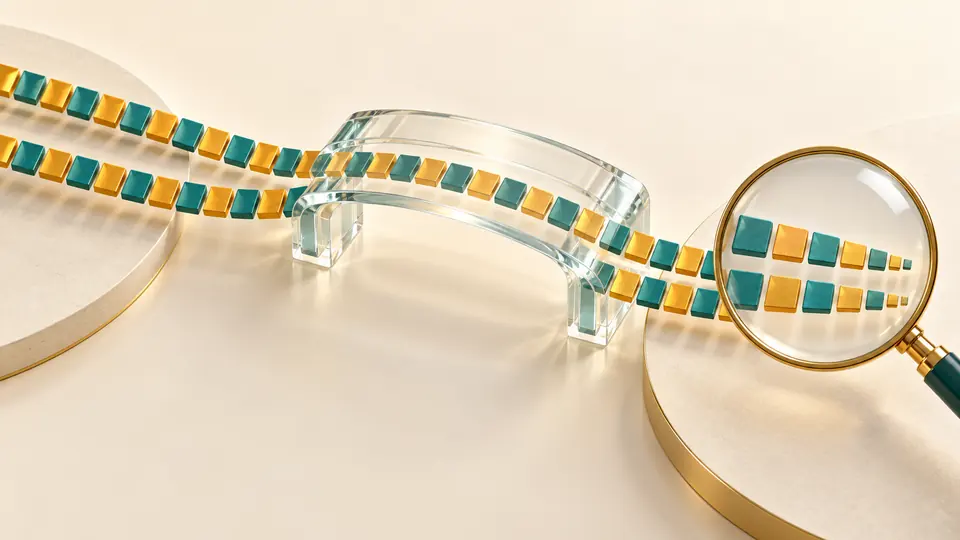 Two complete rows of colored blocks cross a transparent bridge, with a magnifying glass enlarging their ends.